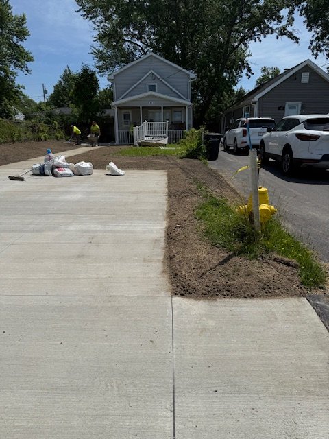 Installation of Drainage, Final Grading and Seeding
