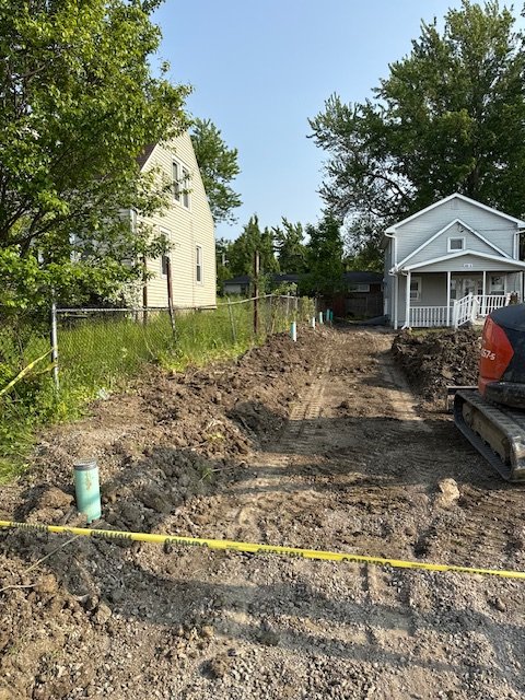 Installation of Drainage, Final Grading and Seeding