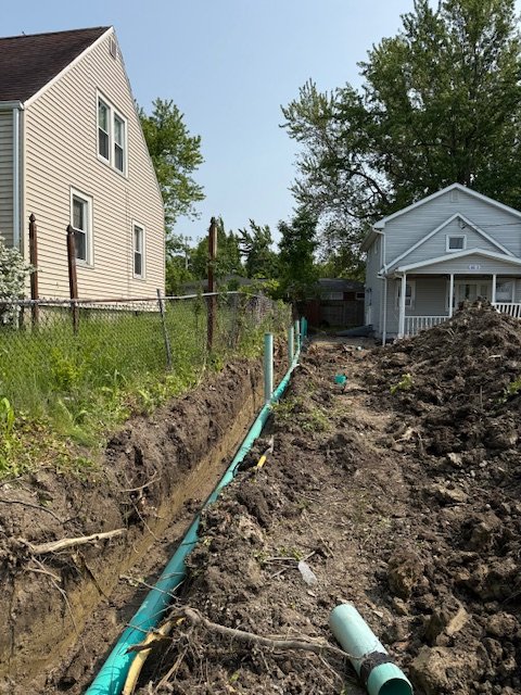 Installation of Drainage, Final Grading and Seeding