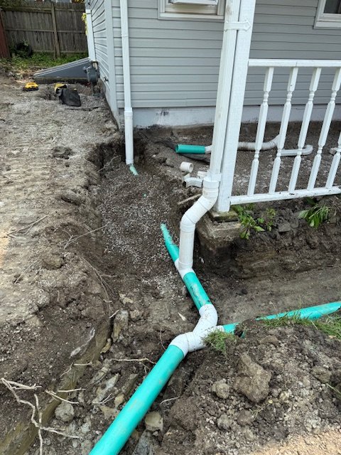 Installation of Drainage, Final Grading and Seeding
