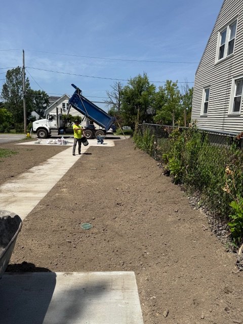 Installation of Drainage, Final Grading and Seeding